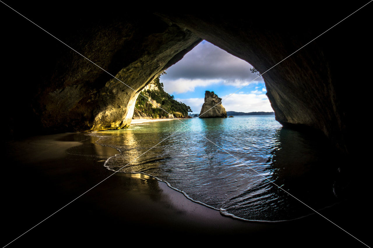 beach-cave-clouds-758524